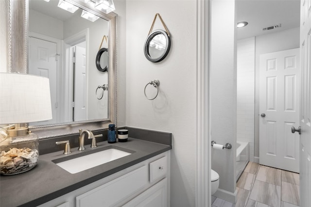 913 Bristlewood Dr, Mckinney, TX 75072 - bathroom featuring vanity and toilet