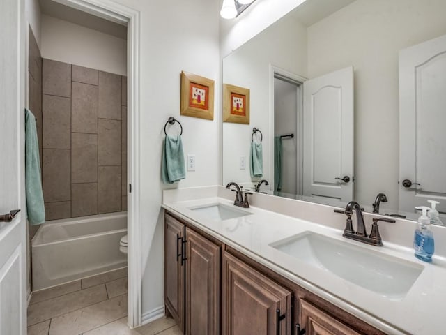 5216 Troupe Rd, Mckinney, TX 75071 - bathroom featuring double vanity, toilet, tile patterned floors, and  shower combination