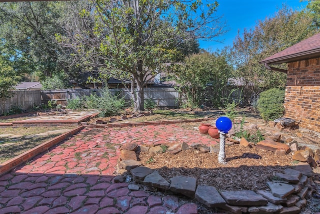 4509 Castle Combe Pl, North Richland Hills, TX 76180 - fenced backyard with a patio area