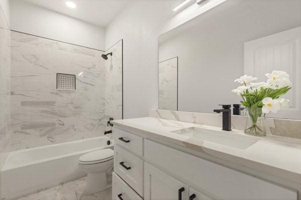 304 Pearl Harbor St, Tool, TX 75143 - full bathroom with marble finish flooring, vanity, toilet, shower / tub combination, and recessed lighting