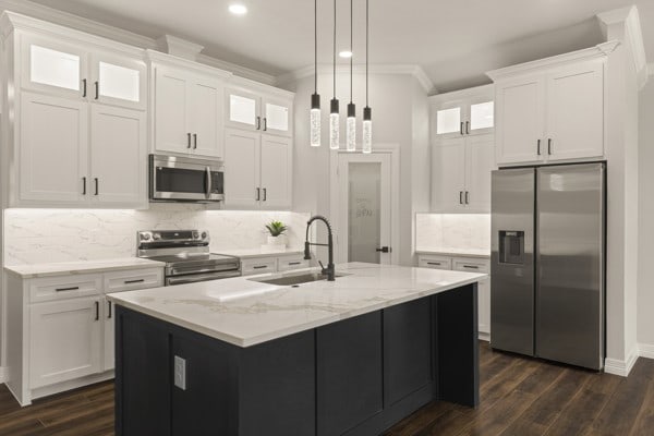 304 Pearl Harbor St, Tool, TX 75143 - kitchen featuring stainless steel appliances, a sink, white cabinetry, dark wood-type flooring, and backsplash