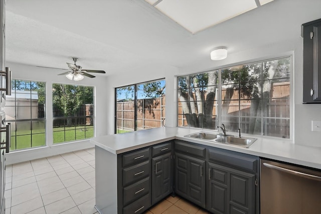 1713 Arvada Dr, Richardson, TX 75081 - kitchen with dishwasher, a peninsula, ceiling fan, light tile patterned flooring, and a sink