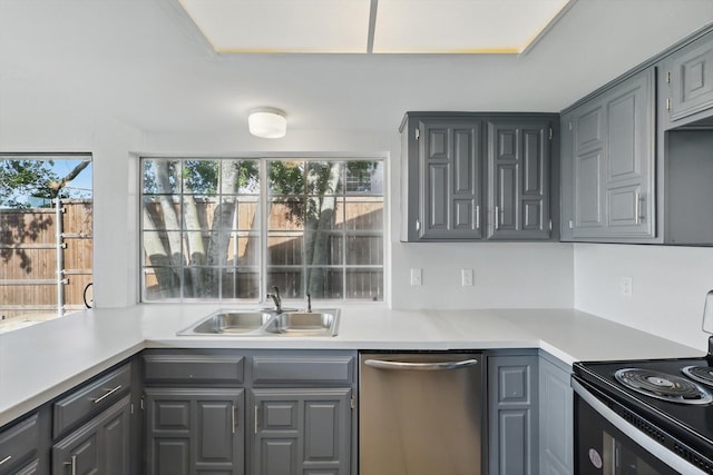 1713 Arvada Dr, Richardson, TX 75081 - kitchen featuring stainless steel dishwasher, gray cabinets, a sink, and black range with electric stovetop