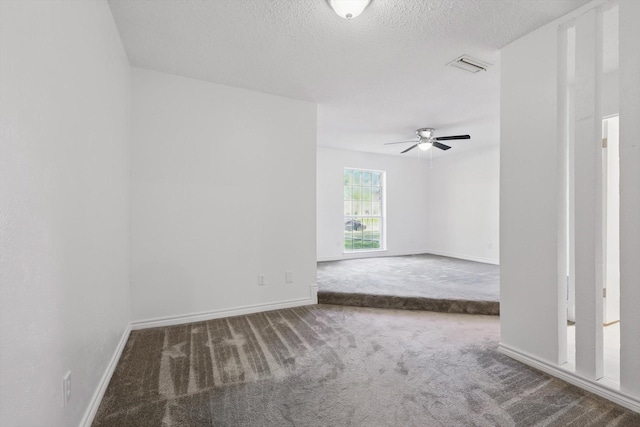 1713 Arvada Dr, Richardson, TX 75081 - carpeted empty room with a ceiling fan, baseboards, and a textured ceiling