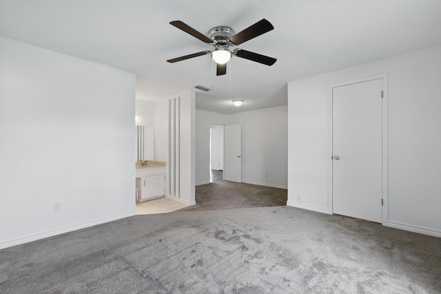 1713 Arvada Dr, Richardson, TX 75081 - unfurnished living room featuring ceiling fan, carpet floors, and baseboards