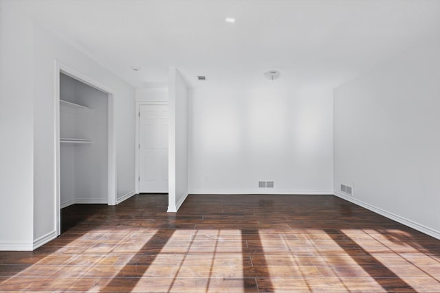 1713 Arvada Dr, Richardson, TX 75081 - unfurnished bedroom featuring hardwood / wood-style flooring and baseboards