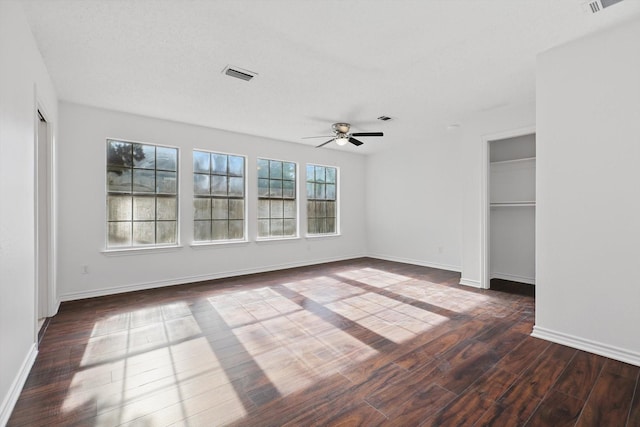 1713 Arvada Dr, Richardson, TX 75081 - unfurnished bedroom with wood finished floors, baseboards, and a closet