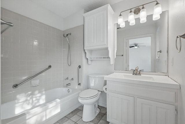1713 Arvada Dr, Richardson, TX 75081 - full bathroom with bathing tub / shower combination, vanity, tile patterned floors, toilet, and a ceiling fan