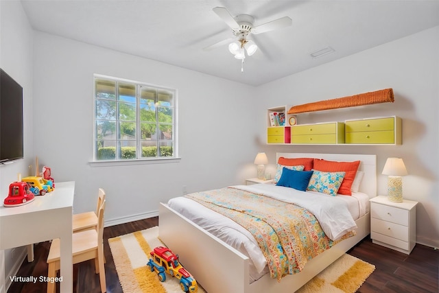 1713 Arvada Dr, Richardson, TX 75081 - bedroom with wood finished floors, baseboards, and a ceiling fan
