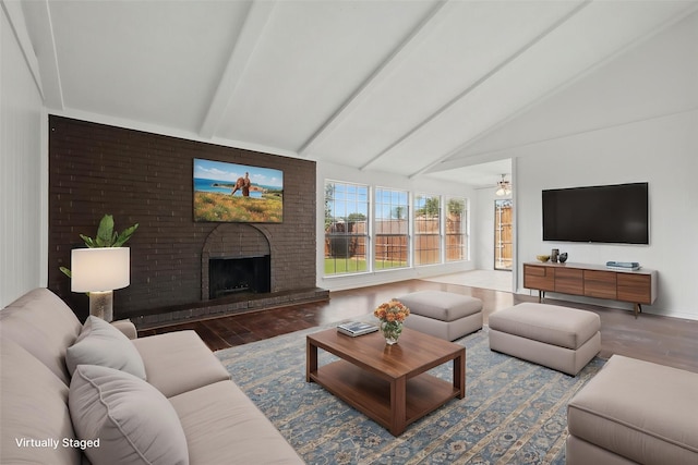 1713 Arvada Dr, Richardson, TX 75081 - living area featuring wood finished floors, a fireplace, and baseboards