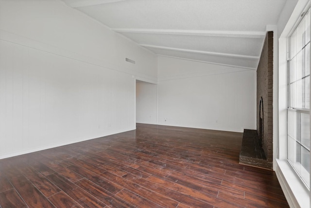 1713 Arvada Dr, Richardson, TX 75081 - spare room featuring hardwood / wood-style flooring and a brick fireplace