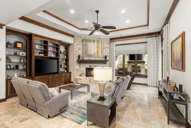 5909 Kittansett Ct, Fort Worth, TX 76132 - living area with ornamental molding, a raised ceiling, ceiling fan, stone tile flooring, and recessed lighting