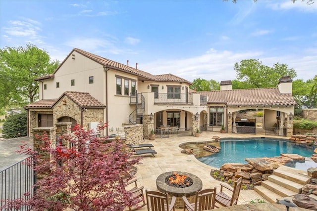 5909 Kittansett Ct, Fort Worth, TX 76132 - swimming pool with a fire pit, a patio area, stairs, and area for grilling
