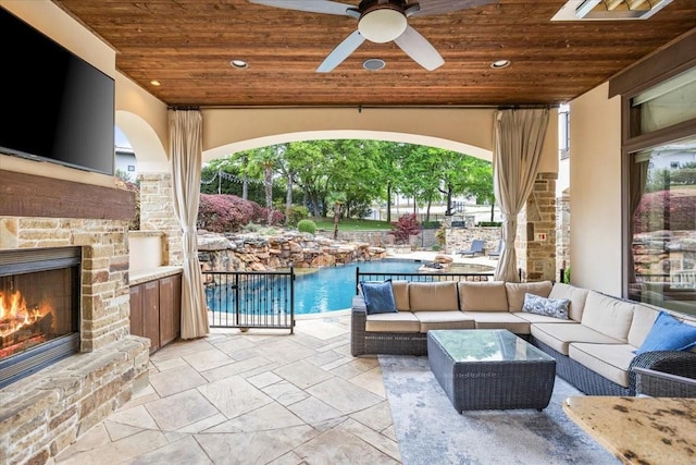 5909 Kittansett Ct, Fort Worth, TX 76132 - view of patio / terrace featuring an outdoor living space with a fireplace, ceiling fan, and an outdoor pool