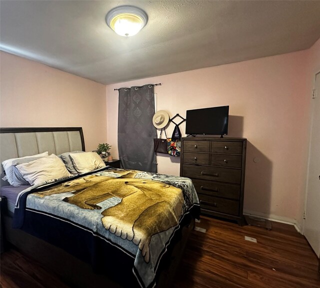 2616 Bardot Ln, Bossier City, LA 71111 - bedroom with wood finished floors and baseboards