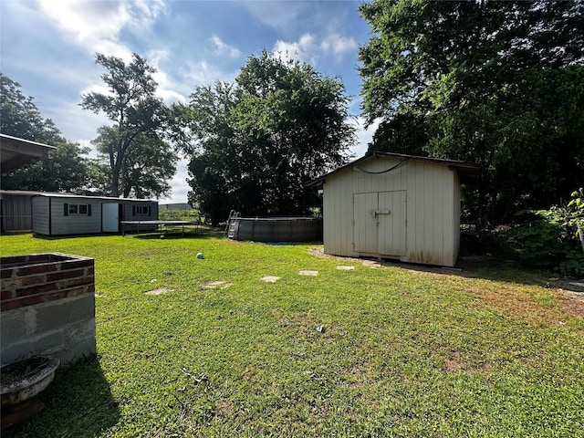 2616 Bardot Ln, Bossier City, LA 71111 - view of green lawn featuring a pool