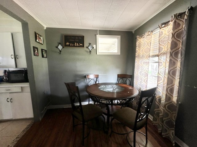 2616 Bardot Ln, Bossier City, LA 71111 - dining room with ornamental molding, wood finished floors, and baseboards