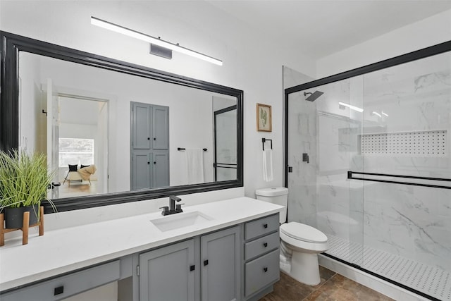 645 Spring Valley Rd, Allen, TX 75002 - bathroom with a marble finish shower, toilet, and vanity