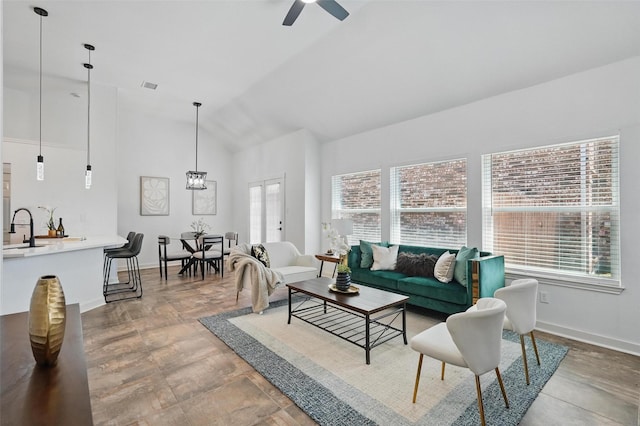 645 Spring Valley Rd, Allen, TX 75002 - living room featuring ceiling fan, baseboards, and high vaulted ceiling