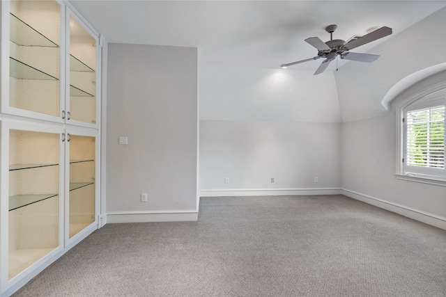 8722 Arbor Park Ct, Dallas, TX 75243 - unfurnished room featuring carpet flooring, vaulted ceiling, a ceiling fan, and baseboards