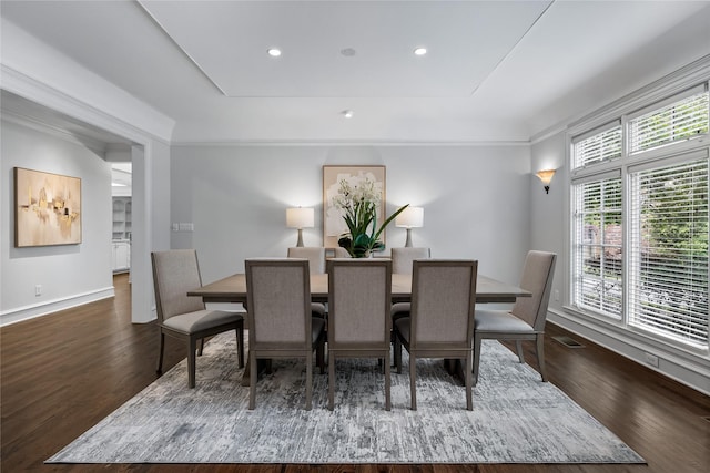8722 Arbor Park Ct, Dallas, TX 75243 - dining room featuring wood finished floors, baseboards, recessed lighting, ornamental molding, and a raised ceiling