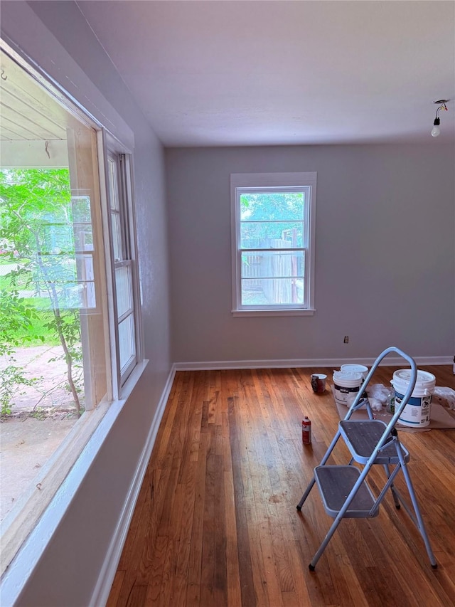 1405 S Hatcher St, Decatur, TX 76234 - spare room with wood-type flooring and baseboards