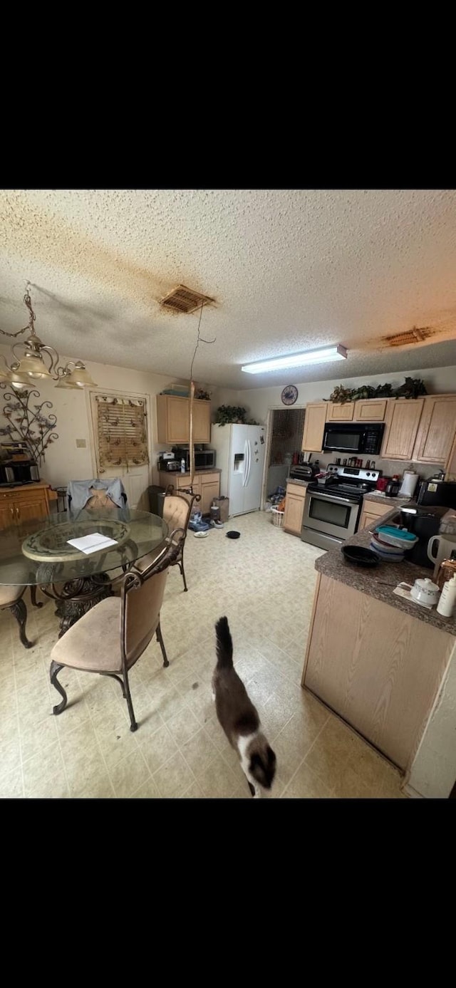 5417 Lansdowne Ave, Fort Worth, TX 76135 - living room with a textured ceiling and tile patterned floors