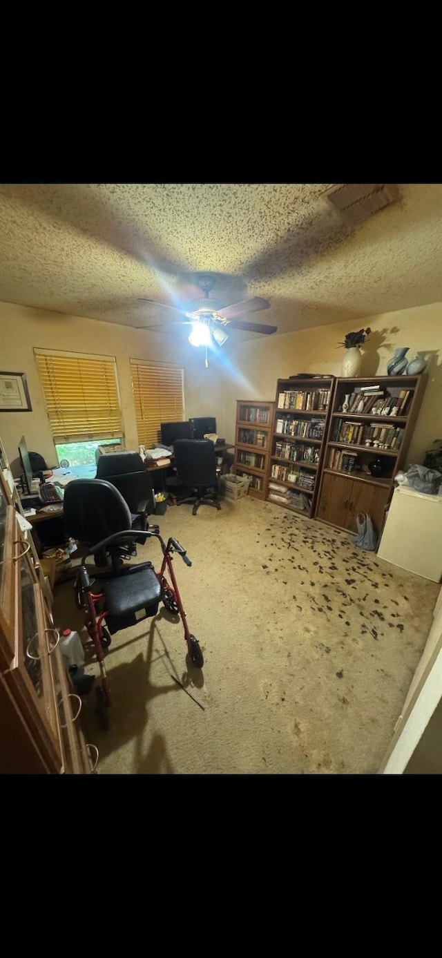 5417 Lansdowne Ave, Fort Worth, TX 76135 - office area featuring a textured ceiling, carpet, and ceiling fan