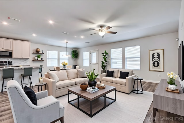 788 Cascade Ln, Princeton, TX 75407 - living room featuring a ceiling fan, light wood-style floors, recessed lighting, and baseboards