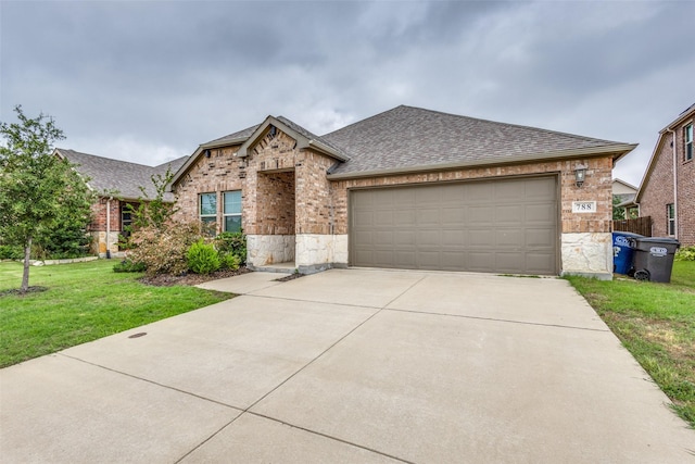788 Cascade Ln, Princeton, TX 75407 - view of front facade featuring a shingled roof, brick siding, driveway, an attached garage, and a front lawn
