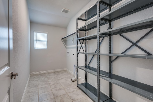 788 Cascade Ln, Princeton, TX 75407 - walk in closet with pet washing station and tile patterned floors