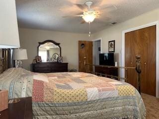 2319 N Wind Dr, Tool, TX 75143 - carpeted bedroom with a ceiling fan