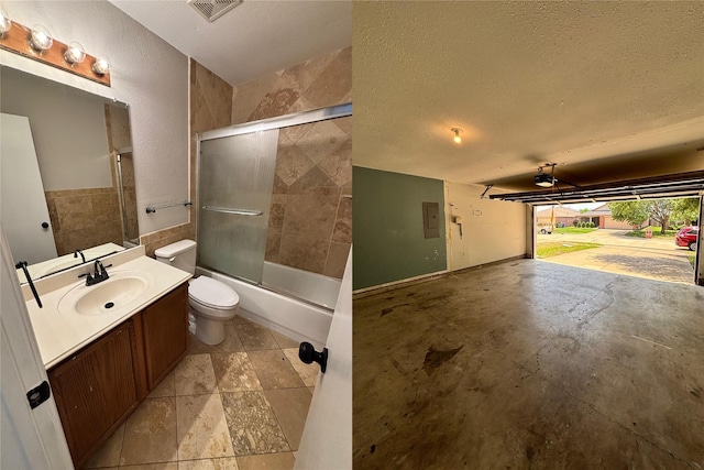 2005 Fairview Dr, Forney, TX 75126 - full bath with toilet, electric panel, vanity, shower / bath combination with glass door, and a textured ceiling