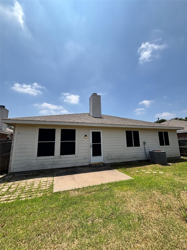 2005 Fairview Dr, Forney, TX 75126 - rear view of house with a patio area and a chimney