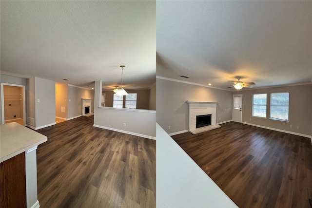2005 Fairview Dr, Forney, TX 75126 - unfurnished living room featuring a fireplace, a ceiling fan, dark wood-style flooring, plenty of natural light, and ornamental molding