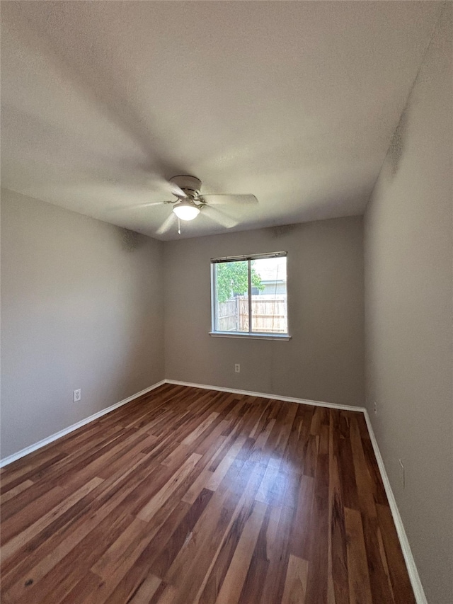 2005 Fairview Dr, Forney, TX 75126 - empty room featuring dark wood-style flooring, a ceiling fan, and a textured ceiling