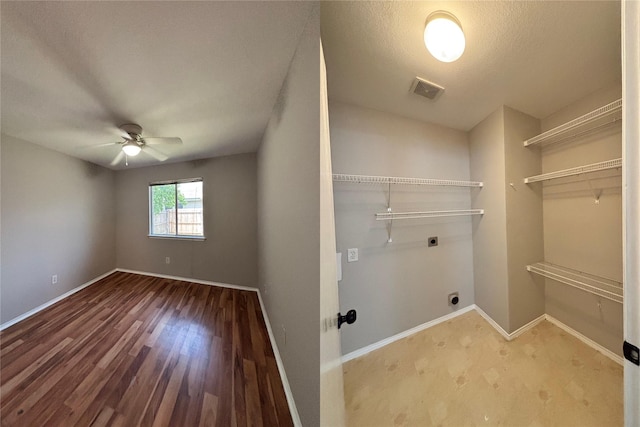 2005 Fairview Dr, Forney, TX 75126 - washroom with electric dryer hookup, a ceiling fan, baseboards, and wood finished floors