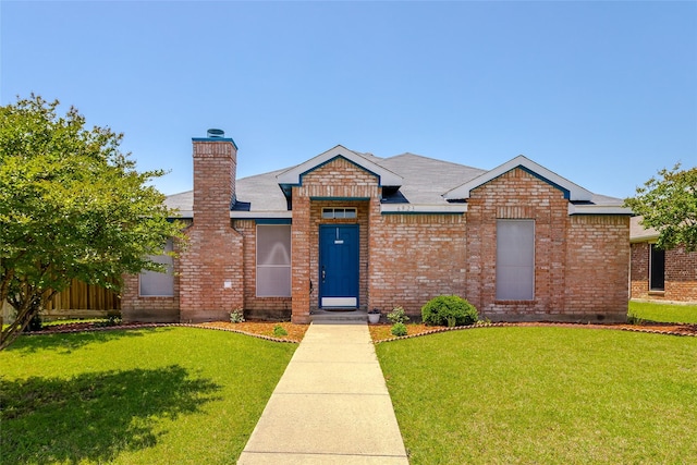 6923 Todd Ln, Sachse, TX 75048 - single story home featuring a front lawn, brick siding, and a chimney