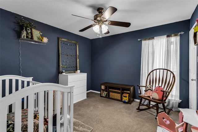 6923 Todd Ln, Sachse, TX 75048 - bedroom with carpet, a crib, and ceiling fan