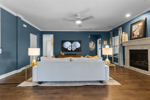 13625 Fishing Hole Ln, Fort Worth, TX 76052 - living room with wood finished floors, crown molding, ceiling fan, a premium fireplace, and baseboards