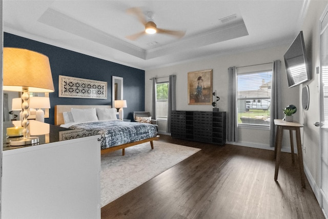 13625 Fishing Hole Ln, Fort Worth, TX 76052 - bedroom featuring a raised ceiling, ornamental molding, wood finished floors, baseboards, and ceiling fan