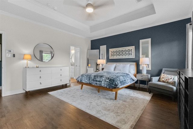 13625 Fishing Hole Ln, Fort Worth, TX 76052 - bedroom with a raised ceiling, crown molding, wood finished floors, ceiling fan, and ensuite bathroom
