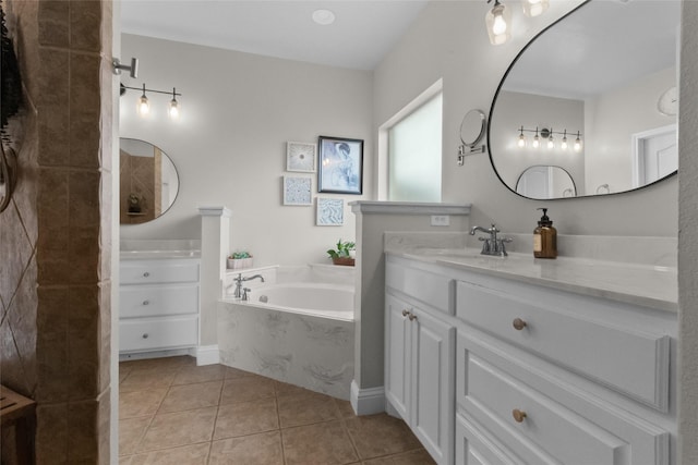 13625 Fishing Hole Ln, Fort Worth, TX 76052 - bathroom with a garden tub, vanity, and tile patterned flooring