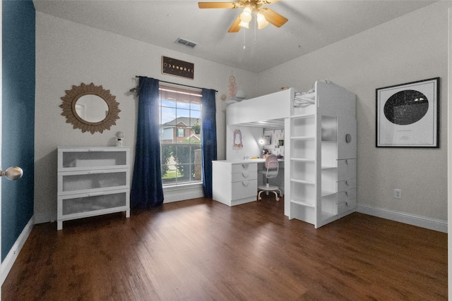 13625 Fishing Hole Ln, Fort Worth, TX 76052 - unfurnished bedroom featuring a desk, baseboards, wood finished floors, and a ceiling fan