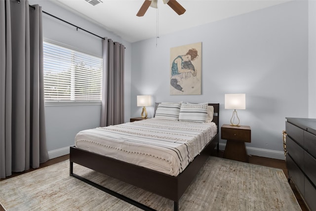 13625 Fishing Hole Ln, Fort Worth, TX 76052 - bedroom featuring baseboards, wood finished floors, and ceiling fan