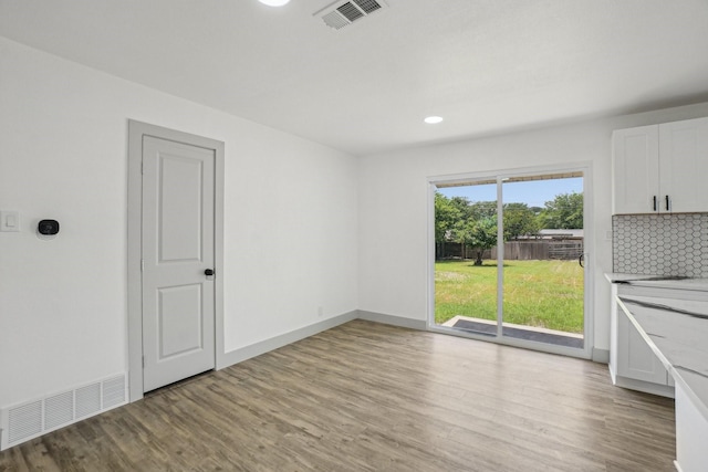 112 Gordon Dr, Azle, TX 76020 - empty room with light wood finished floors, baseboards, and recessed lighting