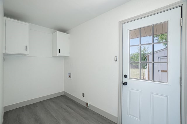112 Gordon Dr, Azle, TX 76020 - washroom with cabinet space, wood finished floors, hookup for a washing machine, and baseboards