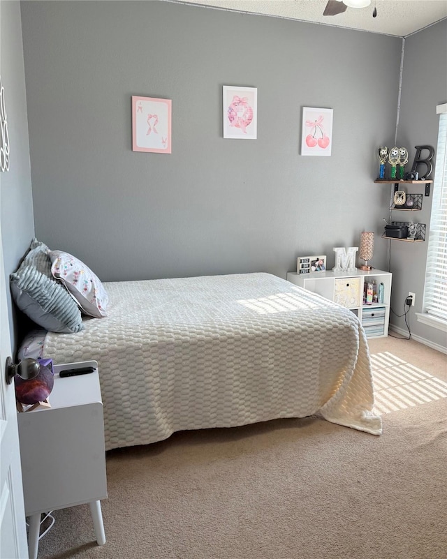 240 County Road 12550, Paris, TX 75462 - bedroom with carpet and a ceiling fan