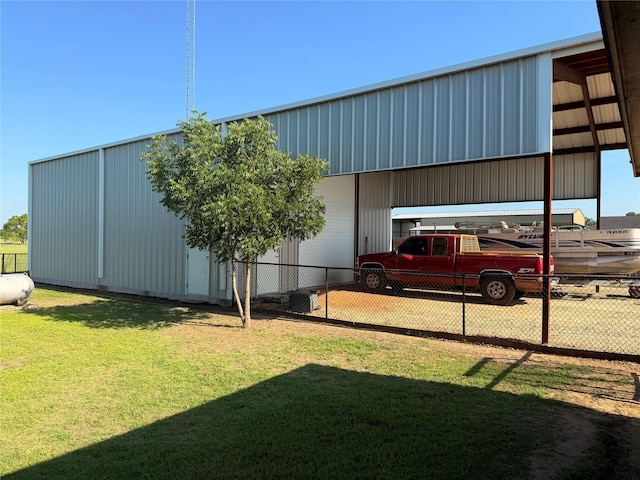 240 County Road 12550, Paris, TX 75462 - view of building exterior with an outbuilding and a carport