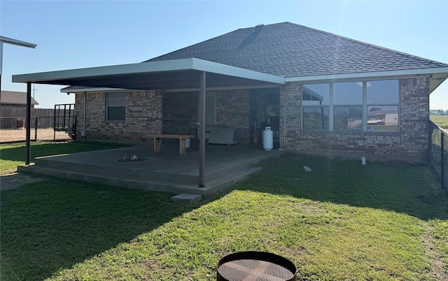 240 County Road 12550, Paris, TX 75462 - rear view of property featuring a shingled roof